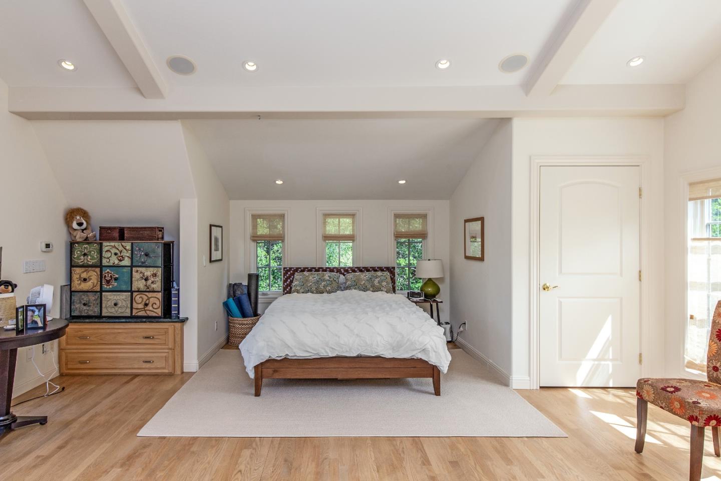 165 Farm Road Woodside, CA 94062 - Photo 29 of 29 a spacious bedroom with a large bed and a wooden floor
