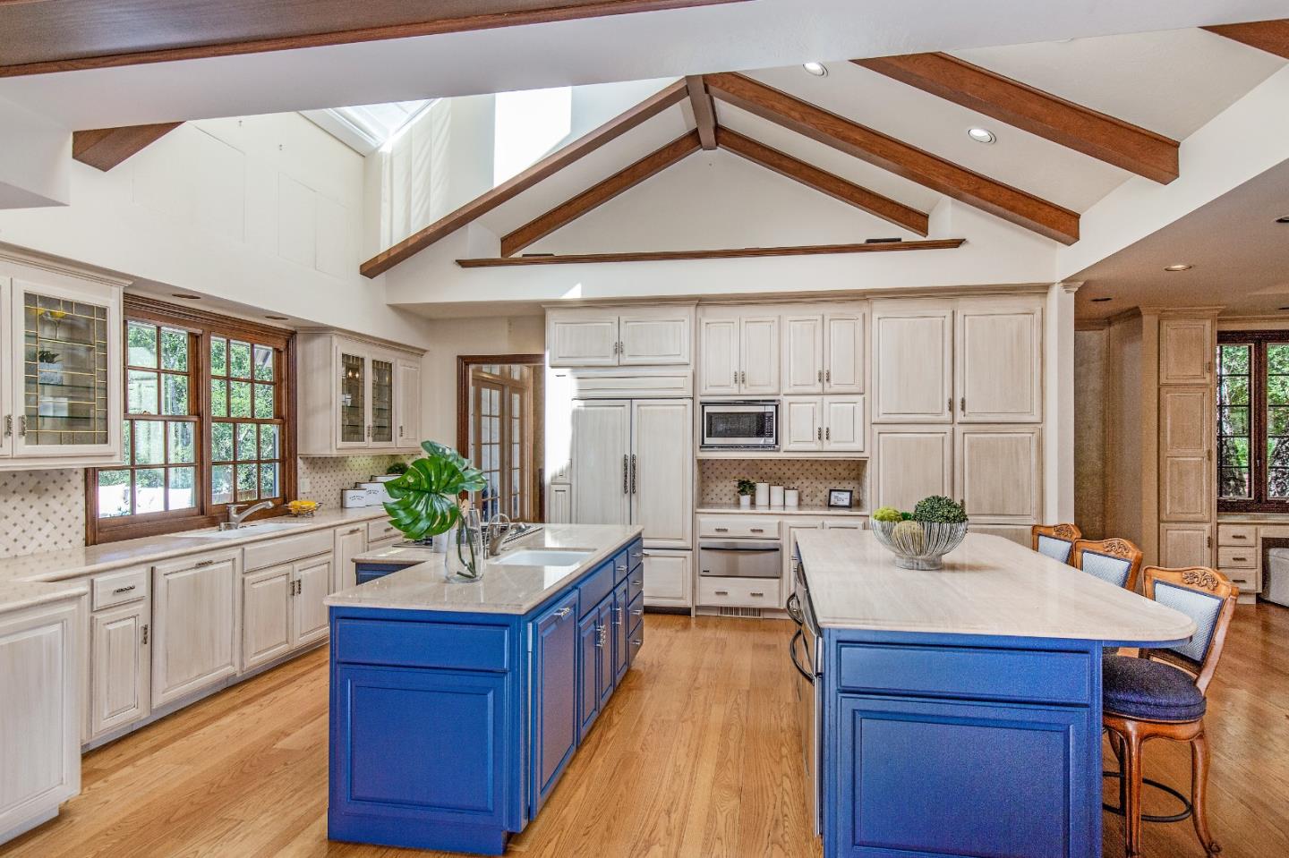 165 Farm Road Woodside, CA 94062 - Photo 3 of 29 a kitchen with a sink appliances and cabinets