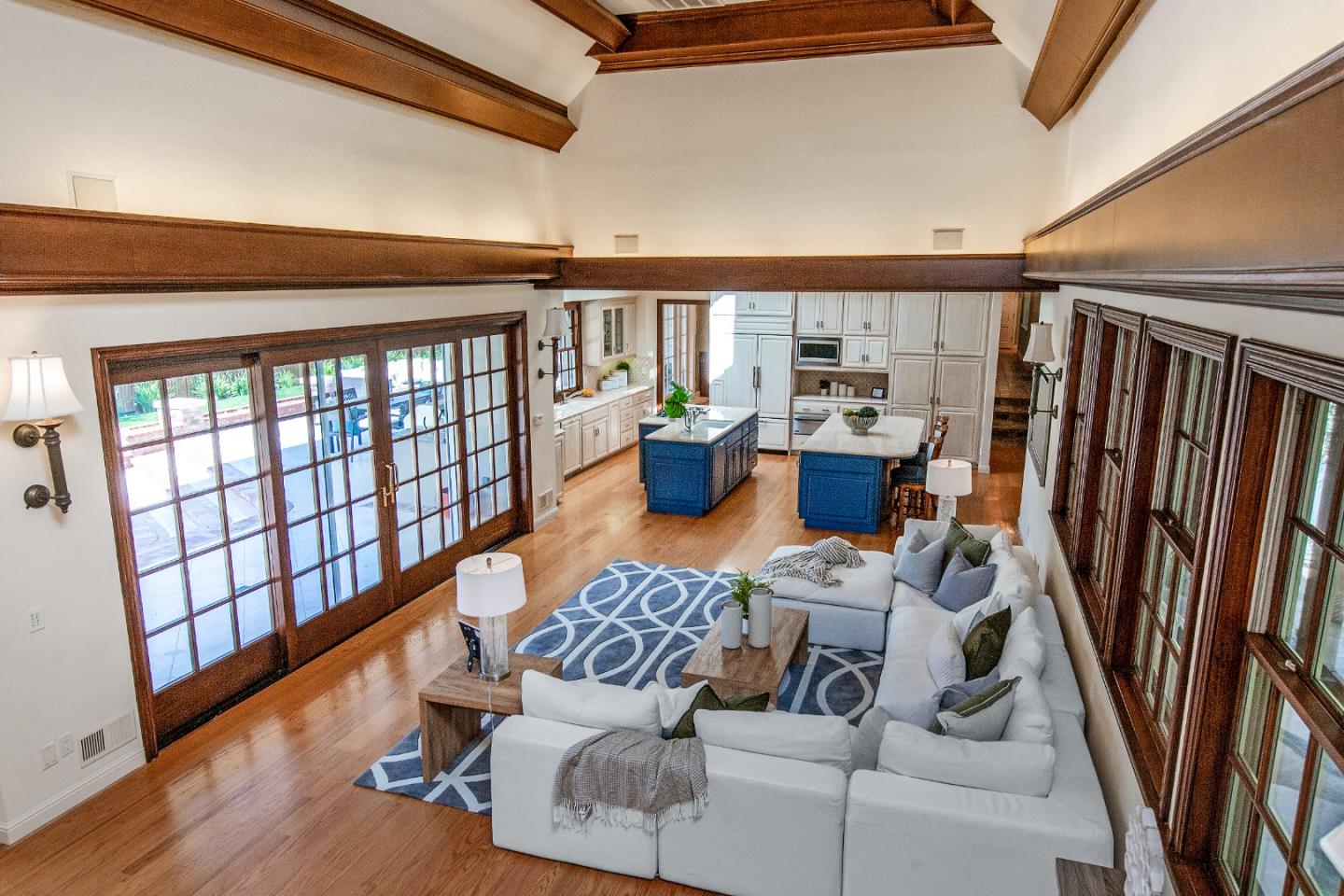 165 Farm Road Woodside, CA 94062 - Photo 6 of 29 a living room with furniture and a floor to ceiling window