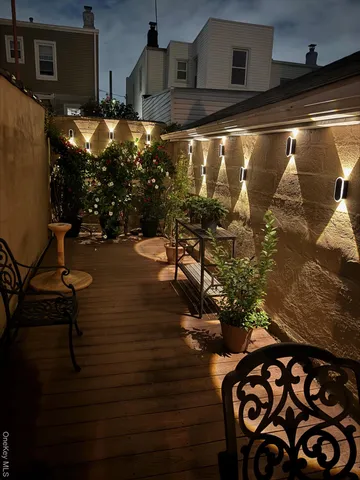 a view of an chairs and table in the patio