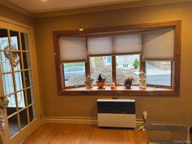 a room with furniture and a window