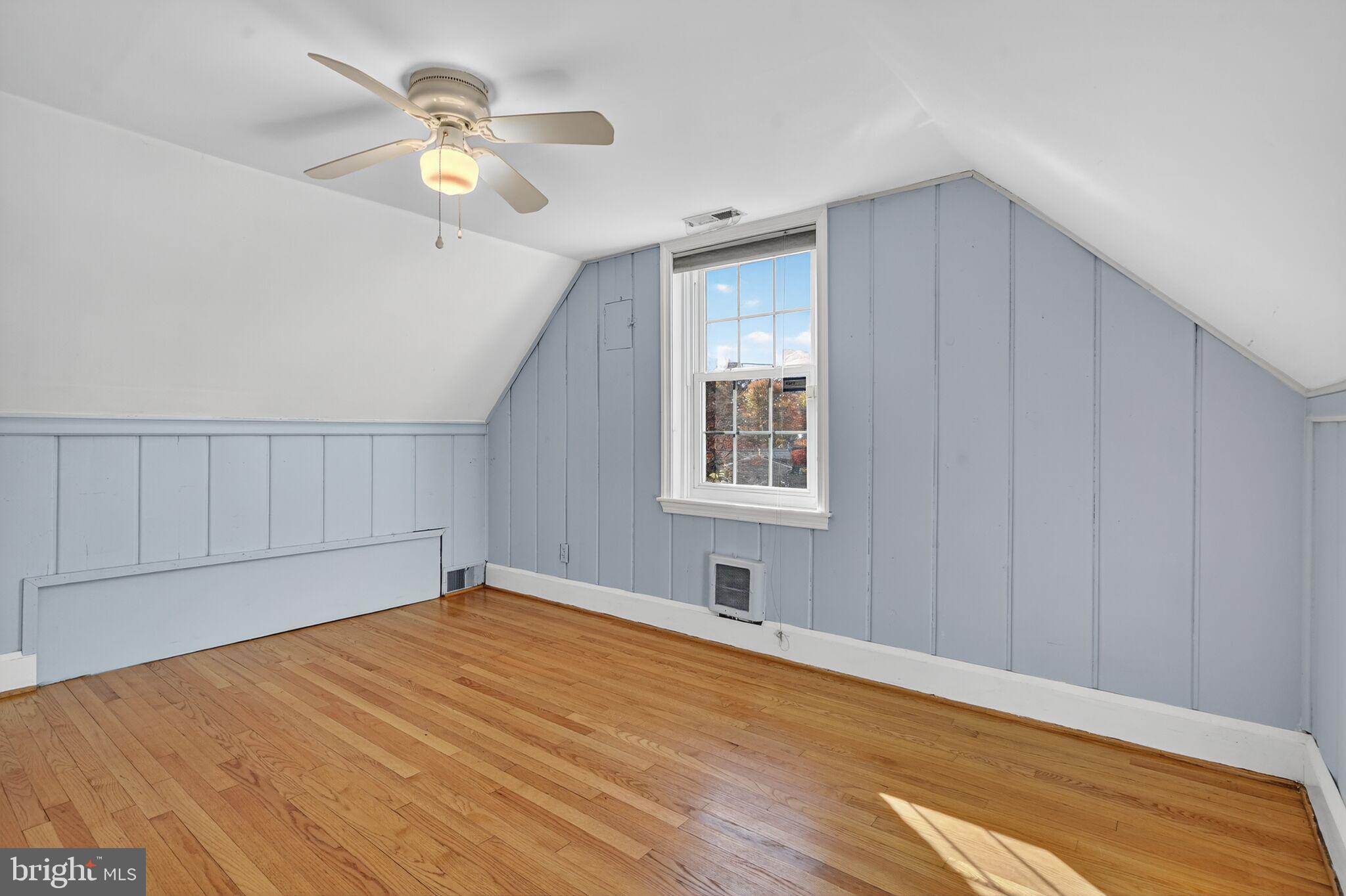 315 Ladson Road Silver Spring, MD 20901 - Photo 19 of 26 a view of an empty room with a window