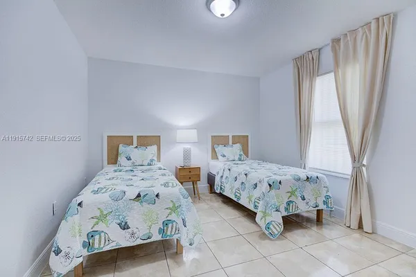 a view of a livingroom with furniture and front door