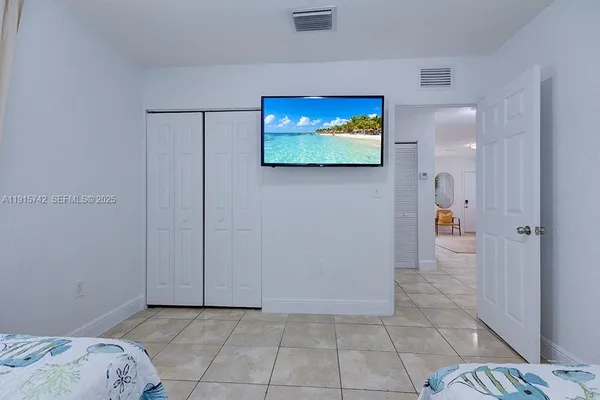 a view of bedroom with a bed