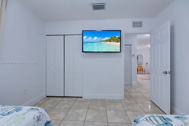 a view of a livingroom with furniture and front door