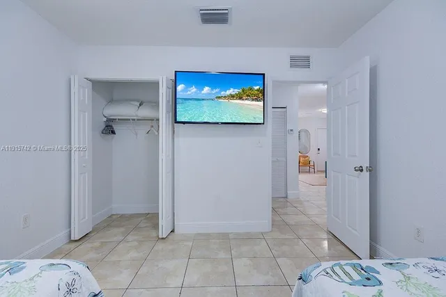 a view of bedroom with a bed