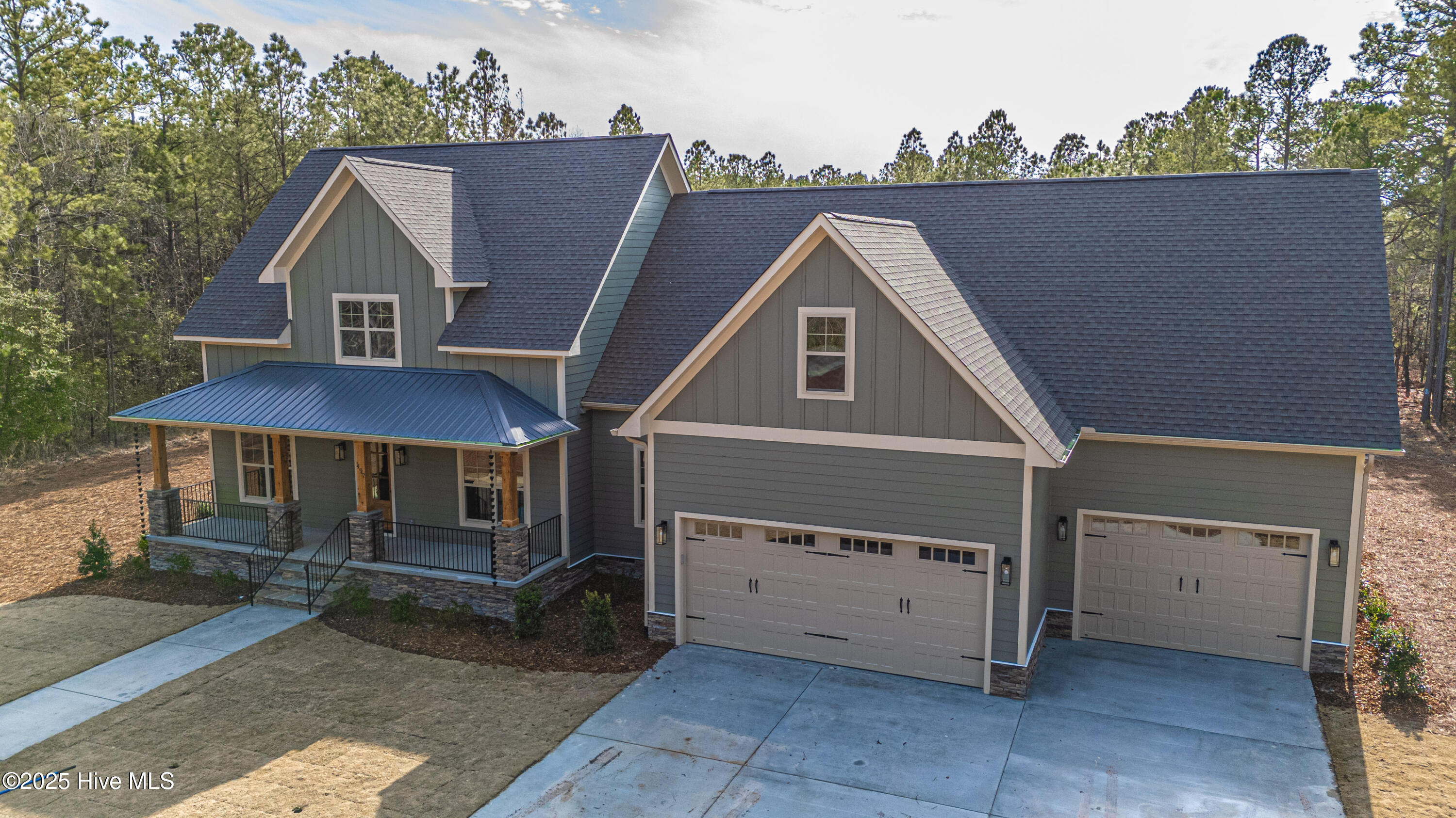 497 Oldham Road West End, NC 27376 - Photo 2 of 62 DJI_20250218144024_0013_D