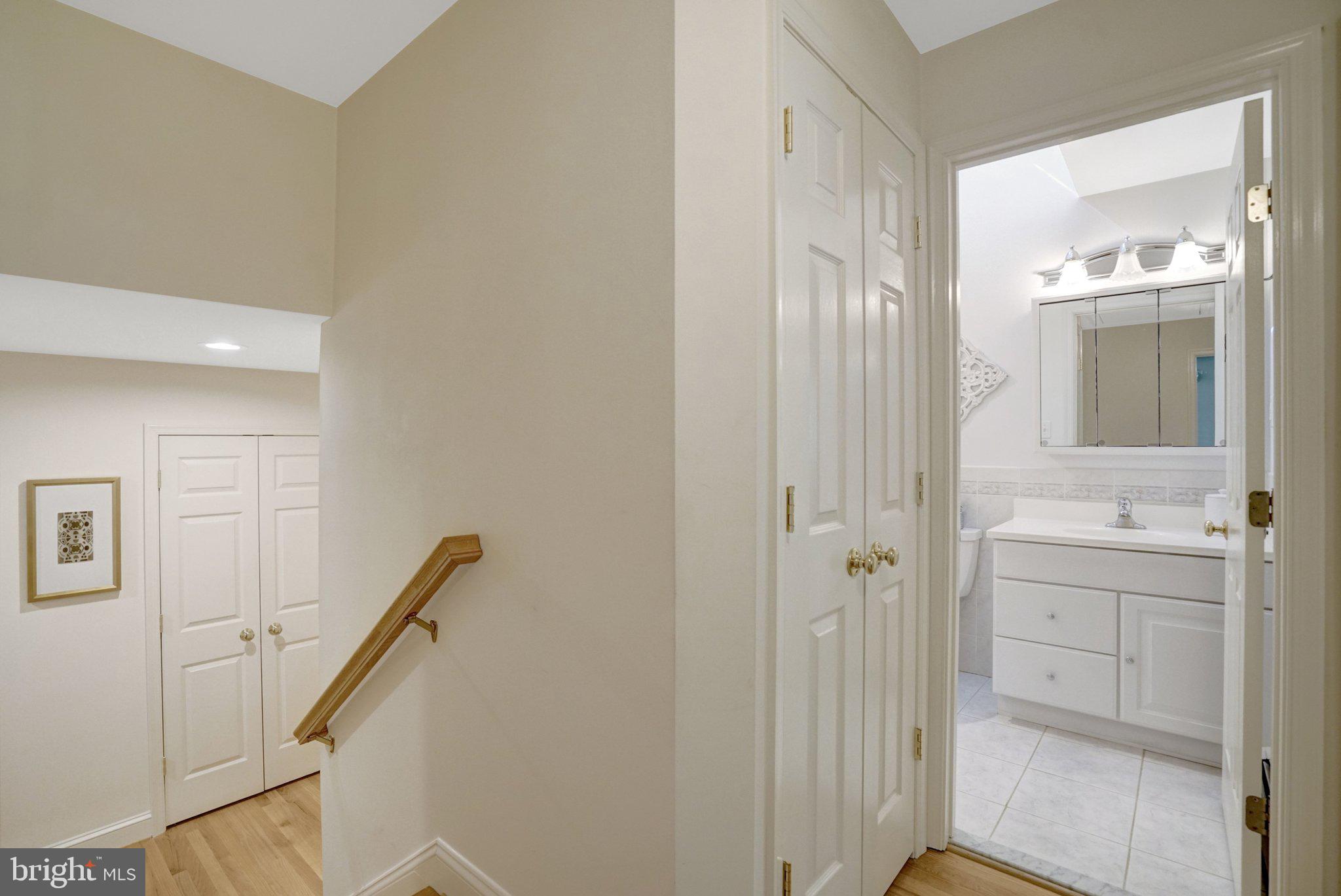 4409 Ferry Landing Road Alexandria, VA 22309 - Photo 30 of 68 Upper level landing w/ stairs to main level