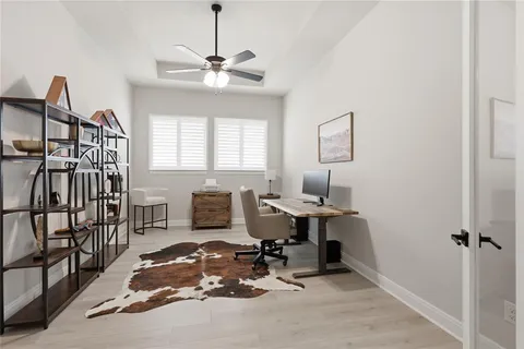 a workspace with chandelier