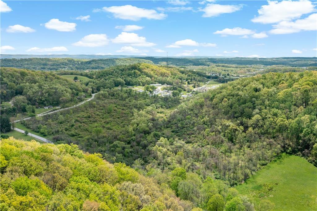 0 Race Track Road New Stanton, PA 15672 - Photo 19 of 30 a view of a city with lush green forest