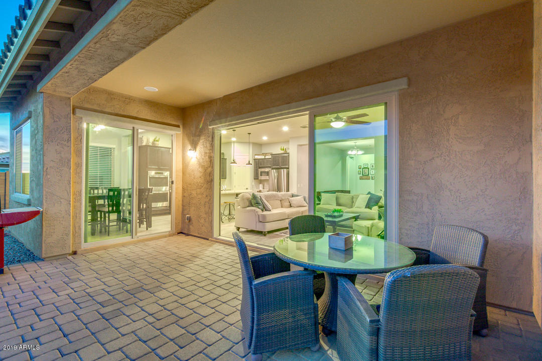 2665 East Stacey Road Gilbert, AZ 85298 - Photo 42 of 56 a view of a dining room with furniture window and outside view