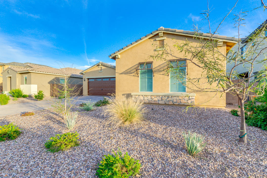 2665 East Stacey Road Gilbert, AZ 85298 - Photo 5 of 56 a front view of a house with a yard