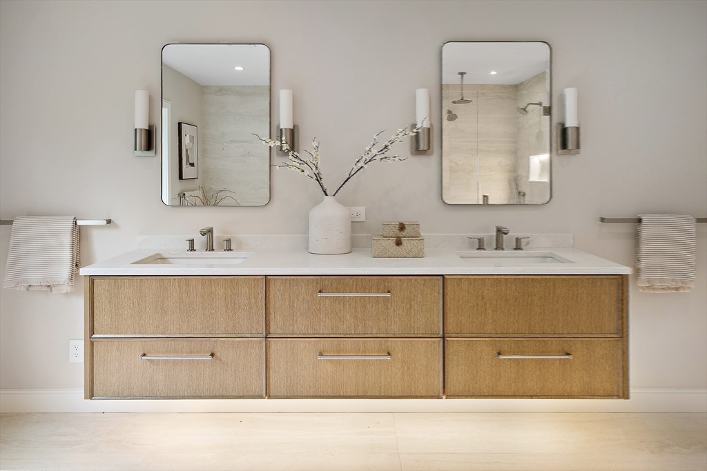 68 Mignon Road Newton, MA 02465 - Photo 15 of 33 a bathroom with a sink vanity and mirror