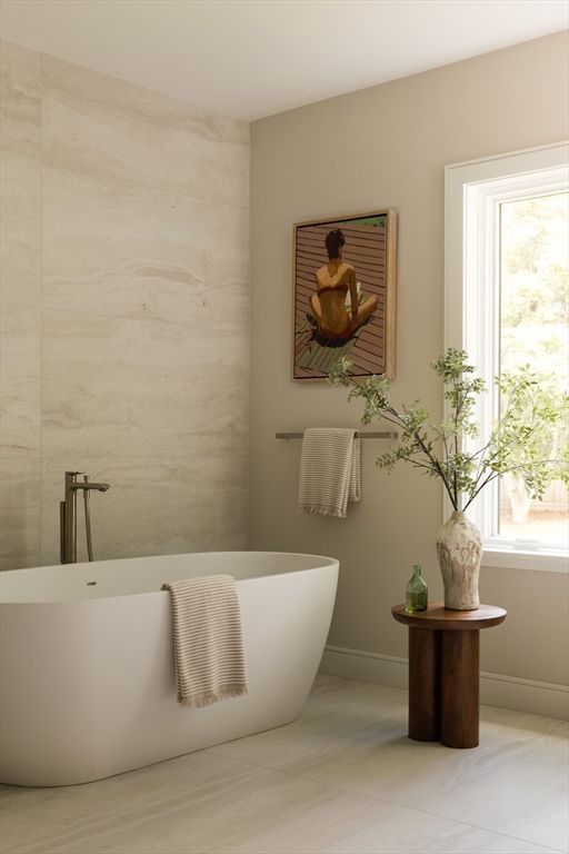 68 Mignon Road Newton, MA 02465 - Photo 17 of 33 a white tub sitting next to a window