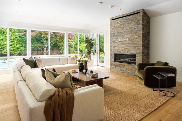 a white tub sitting next to a window