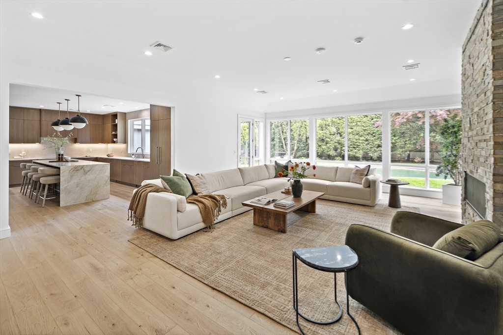 68 Mignon Road Newton, MA 02465 - Photo 8 of 33 a living room with furniture and a large window