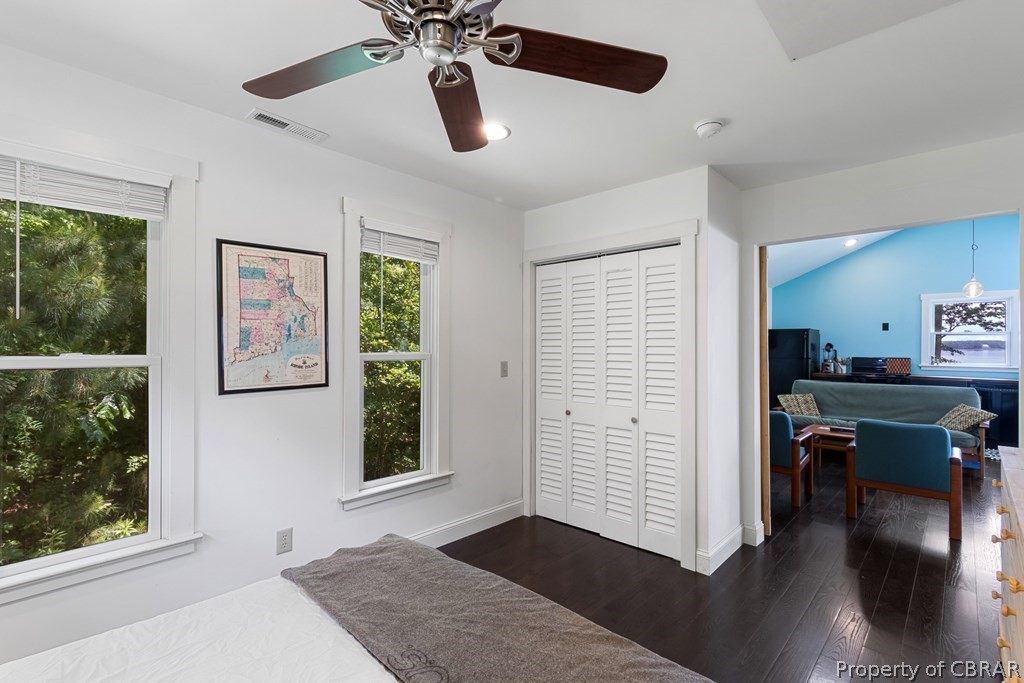90 Bar Point Road Lancaster, VA 22503 - Photo 11 of 33 a bedroom with a bed and a window