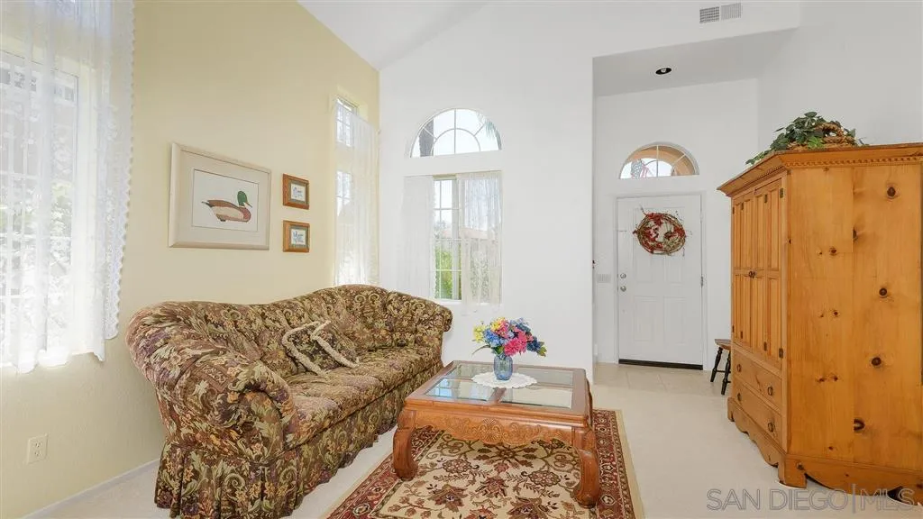 769 Avenida Codorniz San Marcos, CA 92069 - Photo 14 of 25 a bedroom with a bed and a window