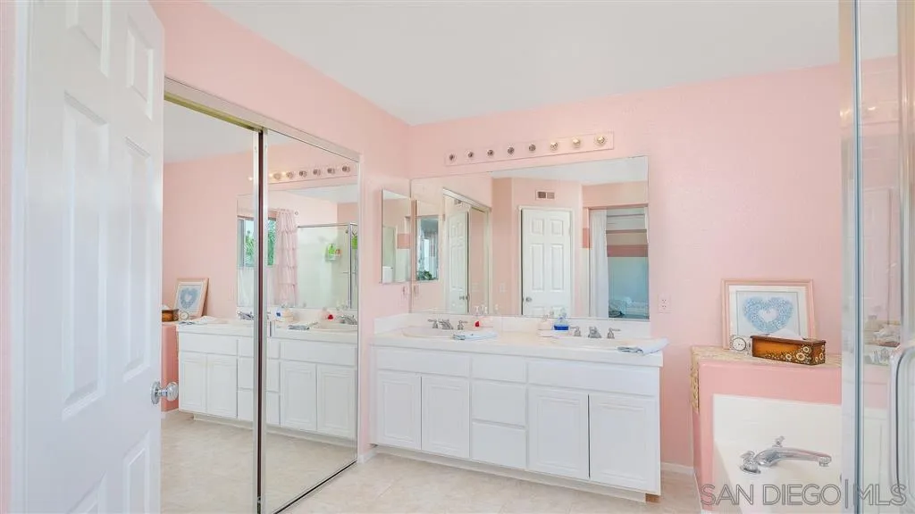 769 Avenida Codorniz San Marcos, CA 92069 - Photo 18 of 25 a bathroom with a double vanity sink mirror and double