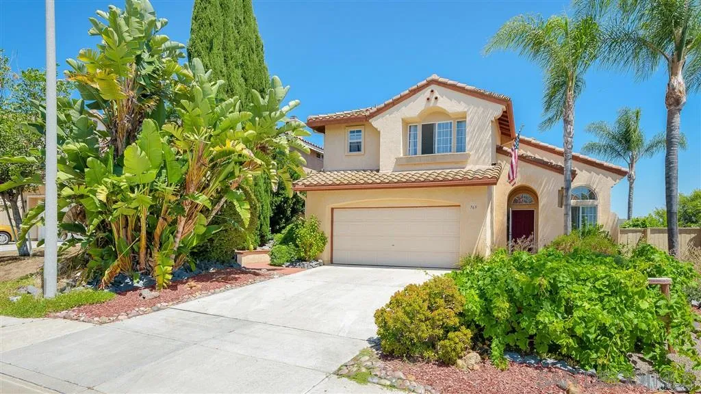769 Avenida Codorniz San Marcos, CA 92069 - Photo 25 of 25 a front view of a house with a garden