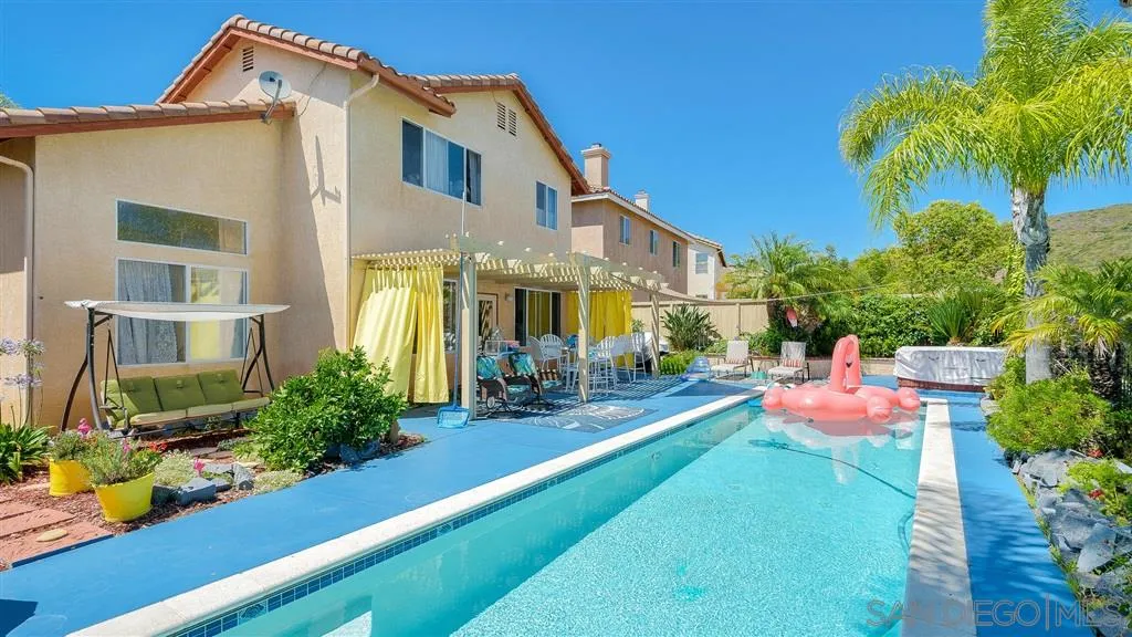 769 Avenida Codorniz San Marcos, CA 92069 - Photo 3 of 25 a front view of a house with yard and sitting area