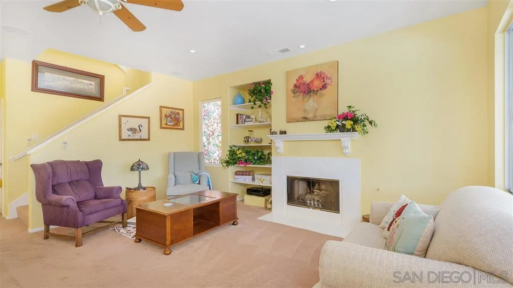 769 Avenida Codorniz San Marcos, CA 92069 - Photo 7 of 25 a living room with furniture and a fireplace
