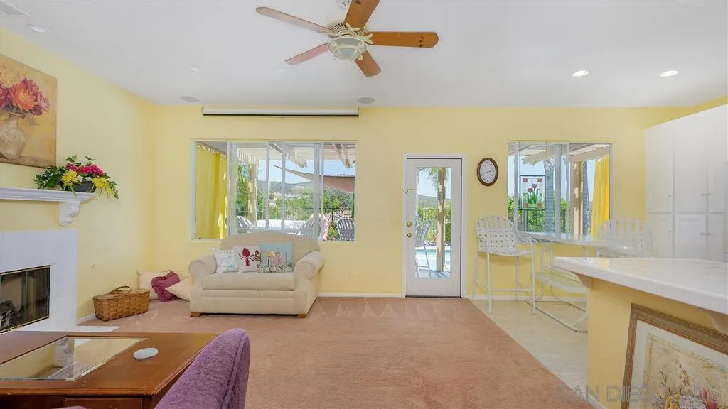 769 Avenida Codorniz San Marcos, CA 92069 - Photo 8 of 25 a spacious bedroom with a bed and a couch