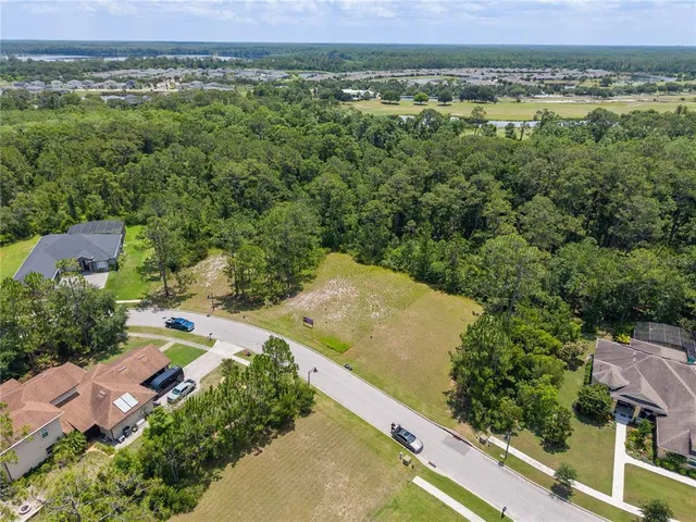 an aerial view of residential house with outdoor space