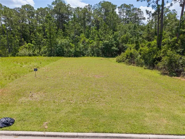 a view of beach and swimming pool