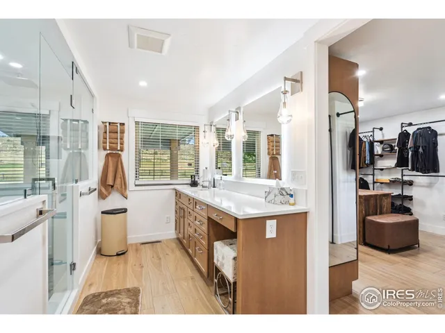 a kitchen with a sink stove and refrigerator