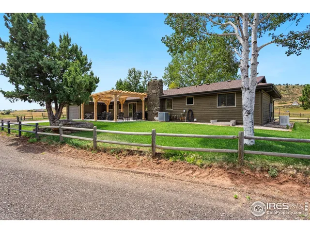 a front view of a house with a small yard