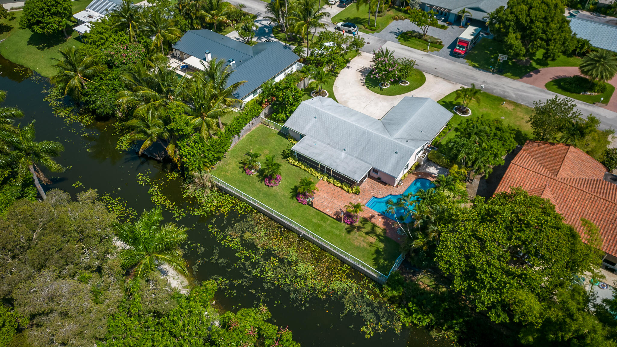 8 Northwest 24th Street Delray Beach, FL 33444 - Photo 1 of 29 an aerial view of a house with a garden