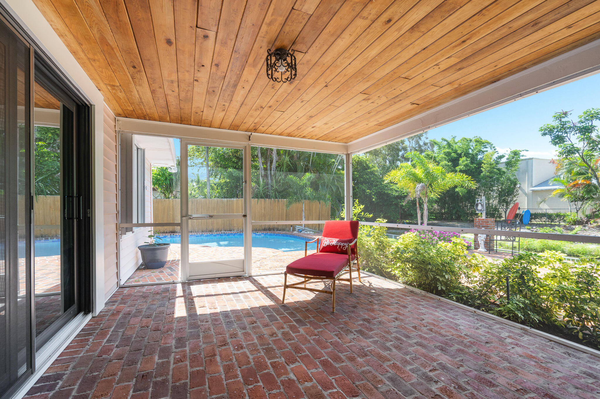 8 Northwest 24th Street Delray Beach, FL 33444 - Photo 22 of 29 a house view with a sitting space and garden view