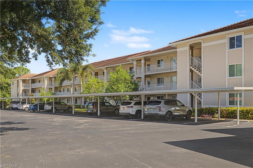 7065 Dennis Circle, Unit F103 Naples, FL 34104 - Photo 1 of 32
