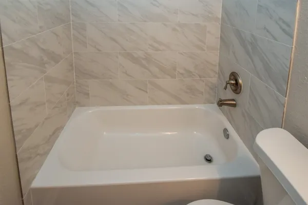 a bathroom with a bathtub