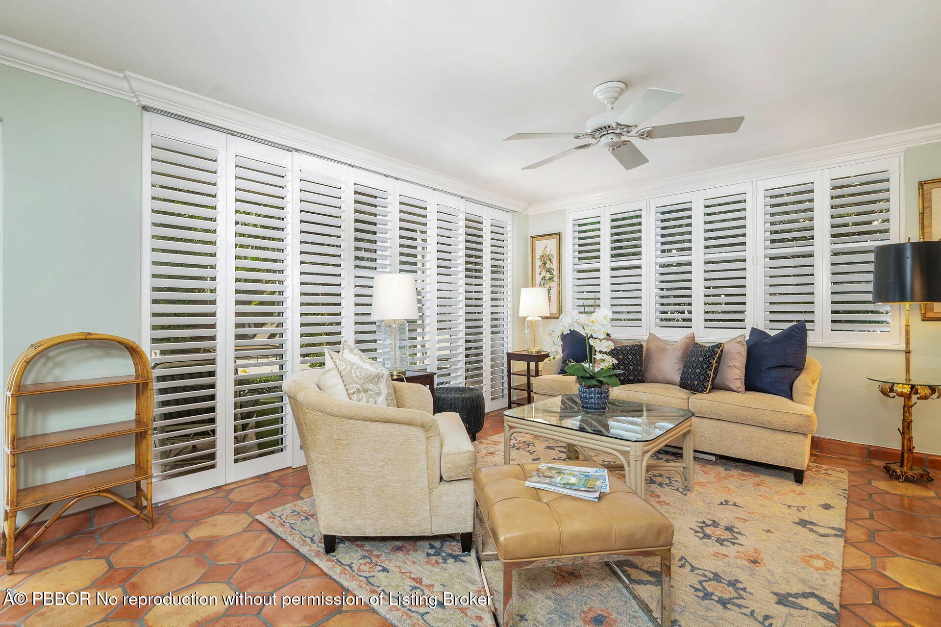 401 Peruvian Avenue, Unit 1050 Palm Beach, FL 33480 - Photo 3 of 17 a living room with furniture and windows