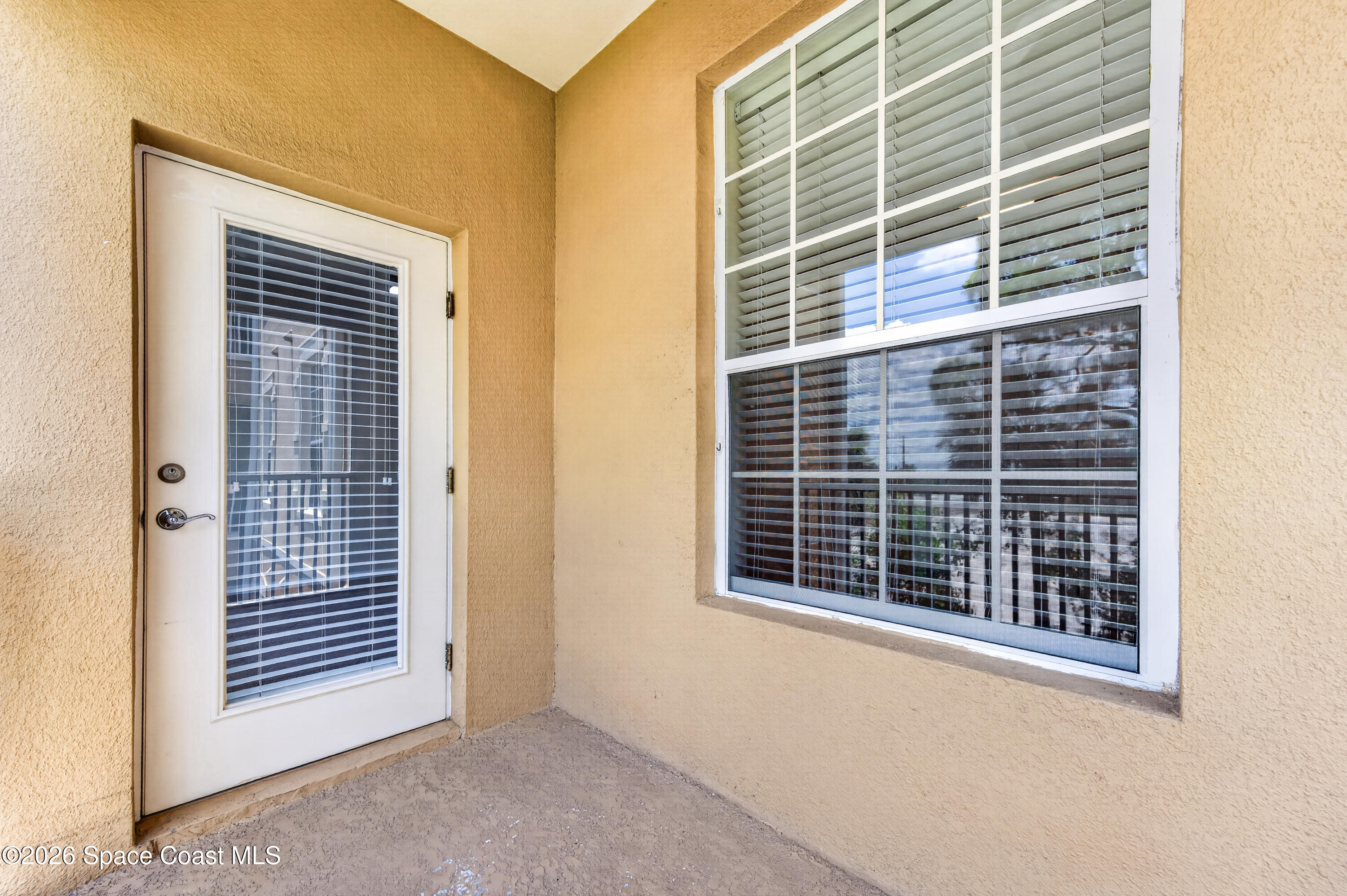 3848 Lexmark Lane, Unit 210 Rockledge, FL 32955 - Photo 18 of 44 Balcony off living room