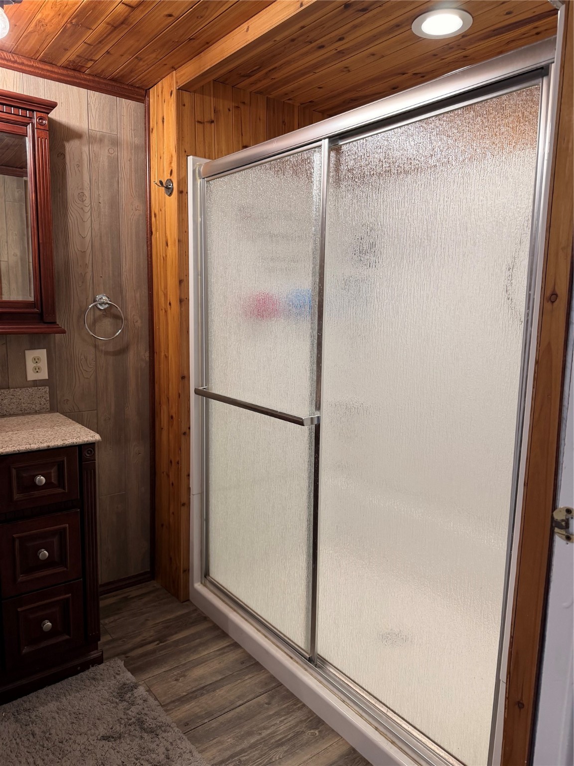 3305 Luza Lane Bryan, TX 77807 - Photo 16 of 21 a bathroom with a glass shower door