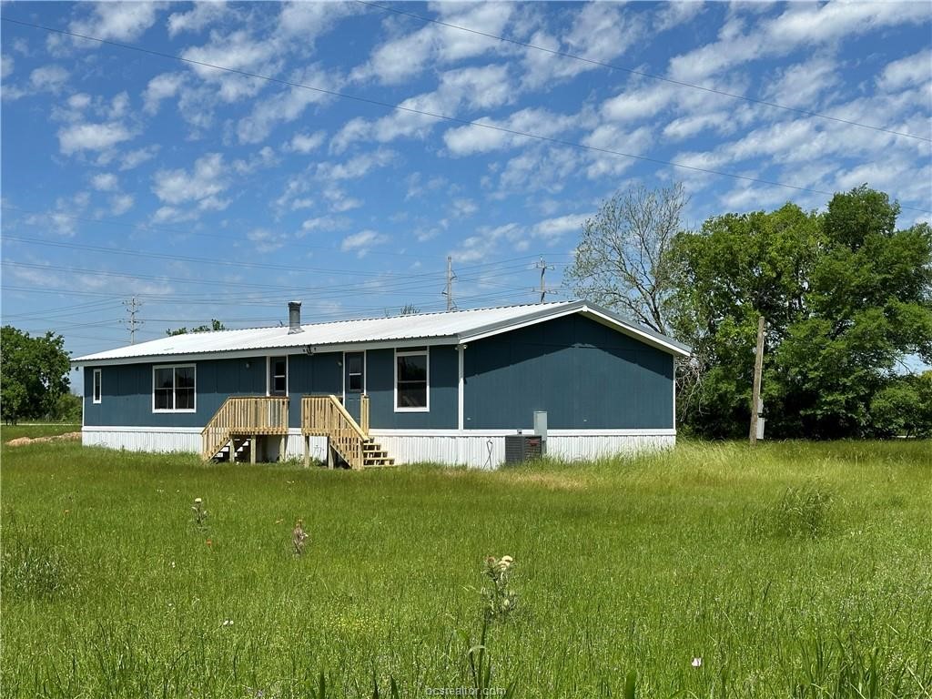 3305 Luza Lane Bryan, TX 77807 - Photo 20 of 21 a front view of a house with a yard