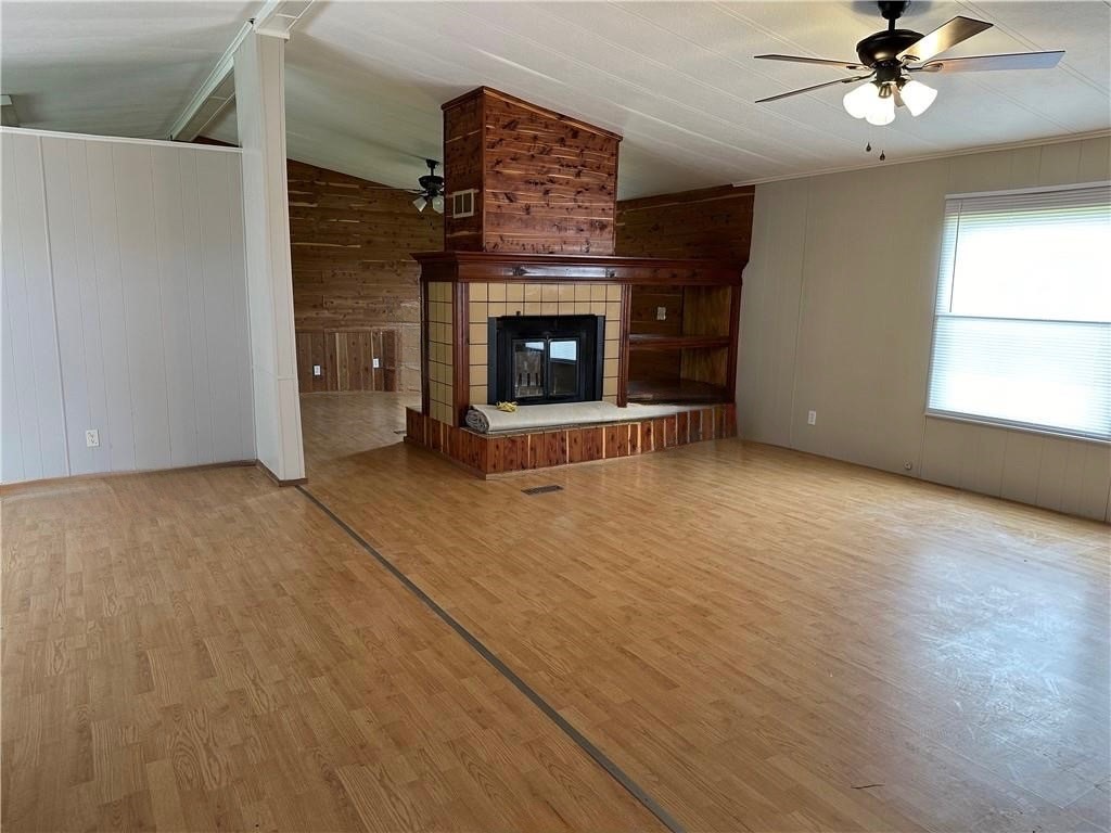 3305 Luza Lane Bryan, TX 77807 - Photo 5 of 21 a view of an empty room with a fireplace and a window