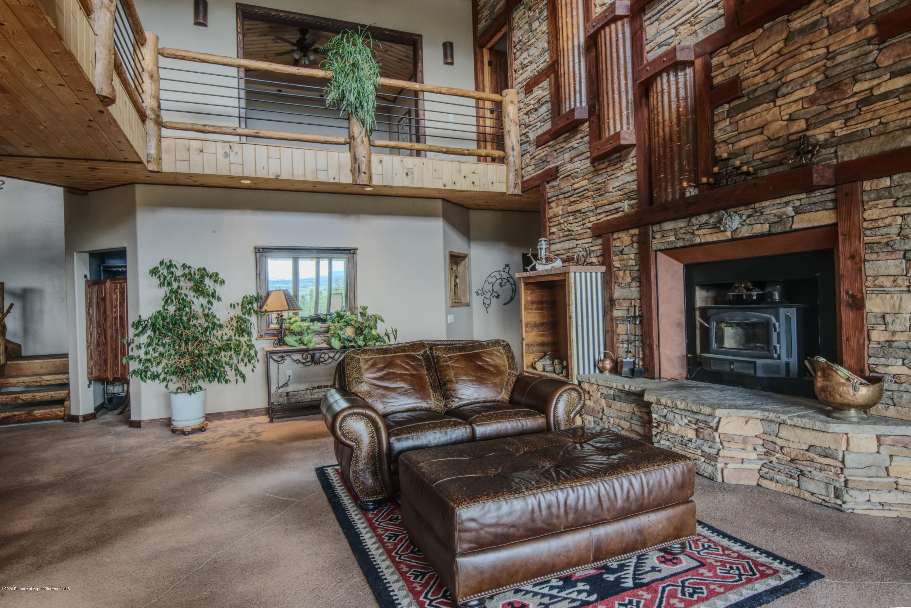 1350 Rincon Ridge Road Durango, CO 81301 - Photo 8 of 48 a view of a couches and a fire pit in the patio