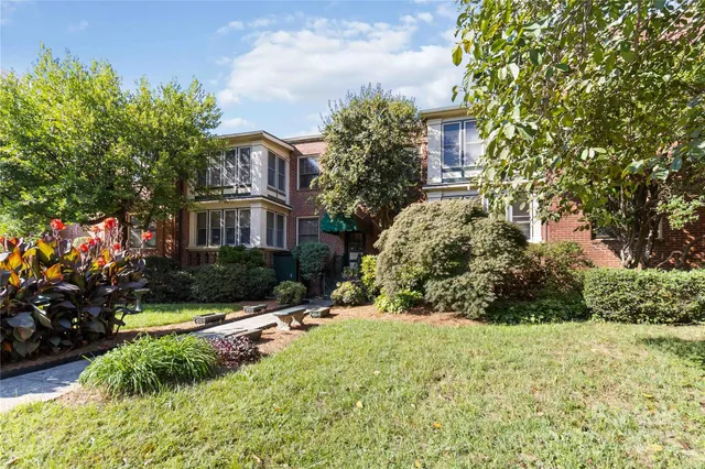 a view of city with tall buildings