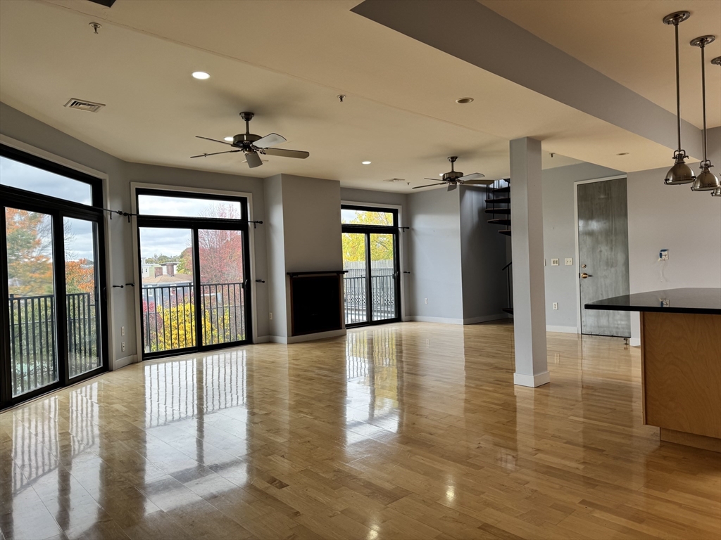 950 Dorchester Avenue, Unit 304 Boston, MA 02125 - Photo 16 of 42 a view of an entryway with wooden floor