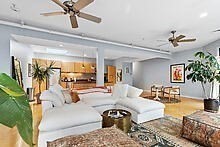 950 Dorchester Avenue, Unit 304 Boston, MA 02125 - Photo 21 of 42 a living room with furniture and a potted plant