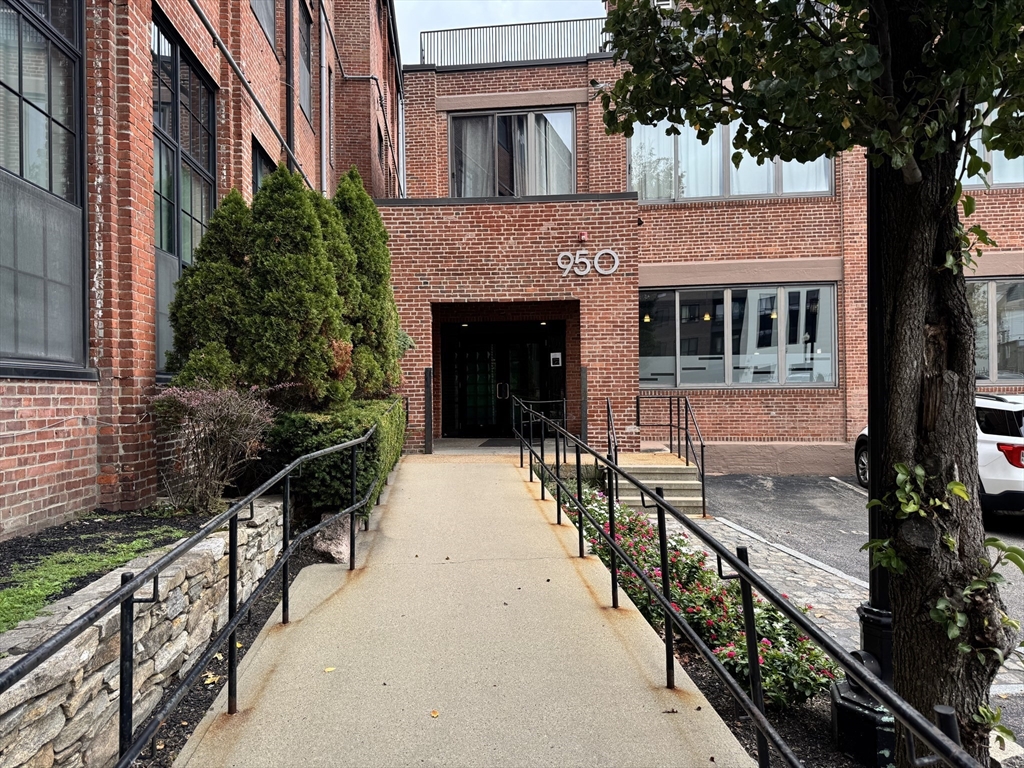 950 Dorchester Avenue, Unit 304 Boston, MA 02125 - Photo 27 of 42 a view of a house with a yard balcony