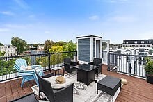 950 Dorchester Avenue, Unit 304 Boston, MA 02125 - Photo 41 of 42 a view of a terrace with furniture