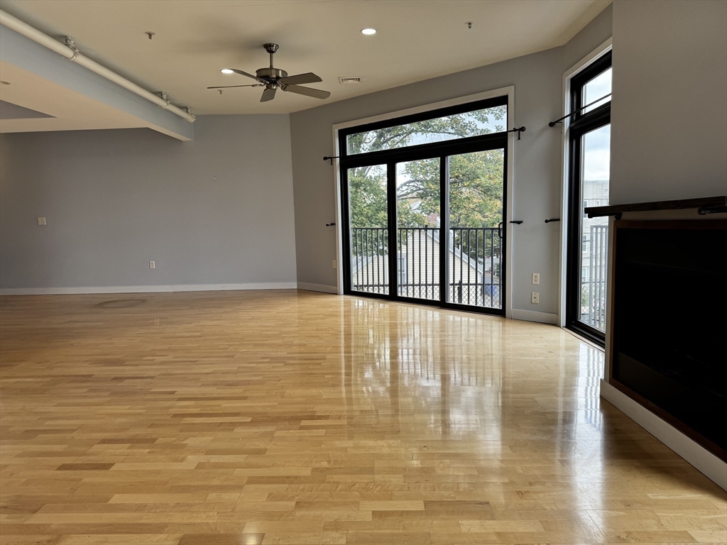 950 Dorchester Avenue, Unit 304 Boston, MA 02125 - Photo 7 of 42 a view of an empty room with a window