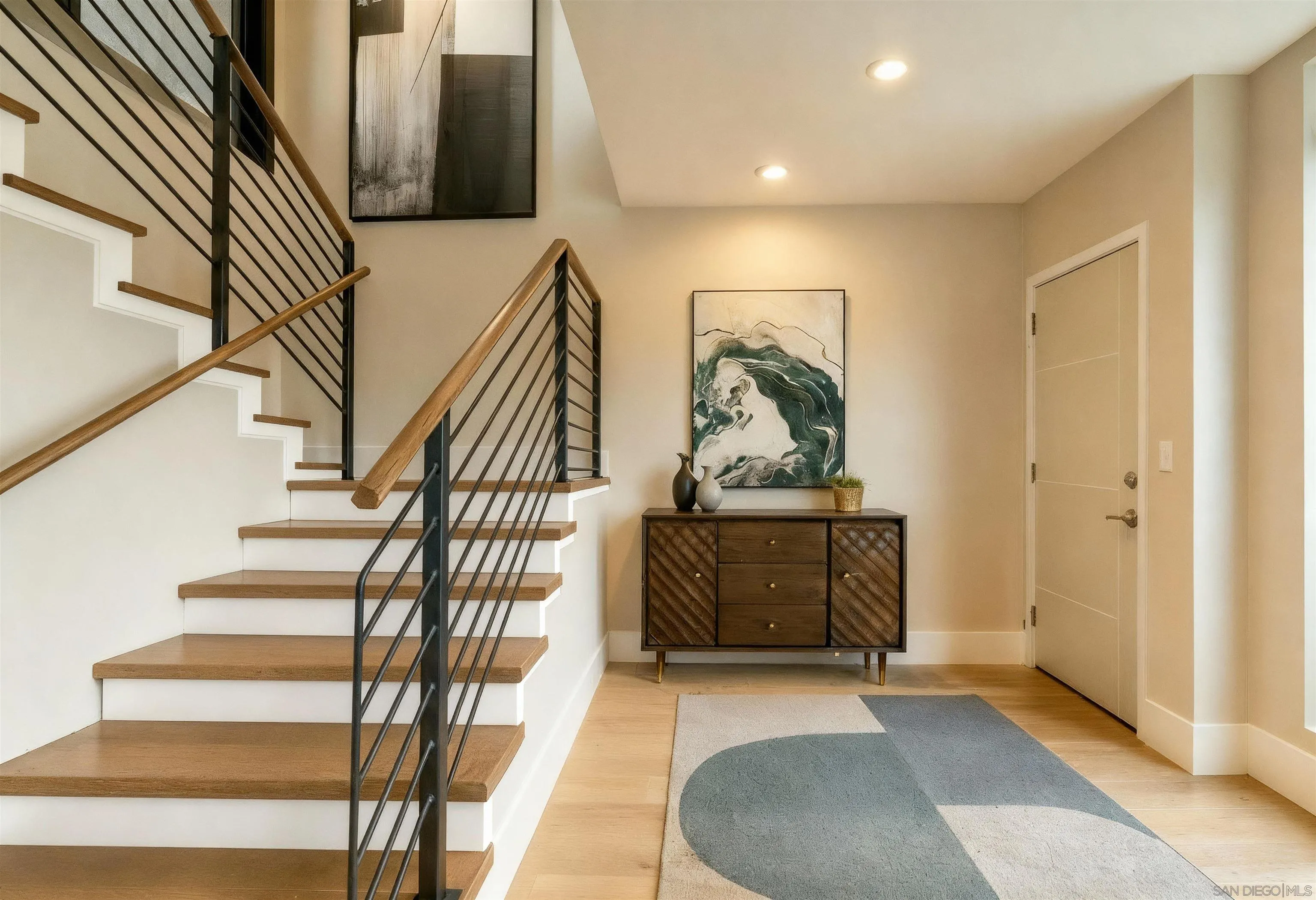 505 North Freeman Street, Unit 201 Oceanside, CA 92054 - Photo 6 of 14 a view of entryway and hall with wooden floor