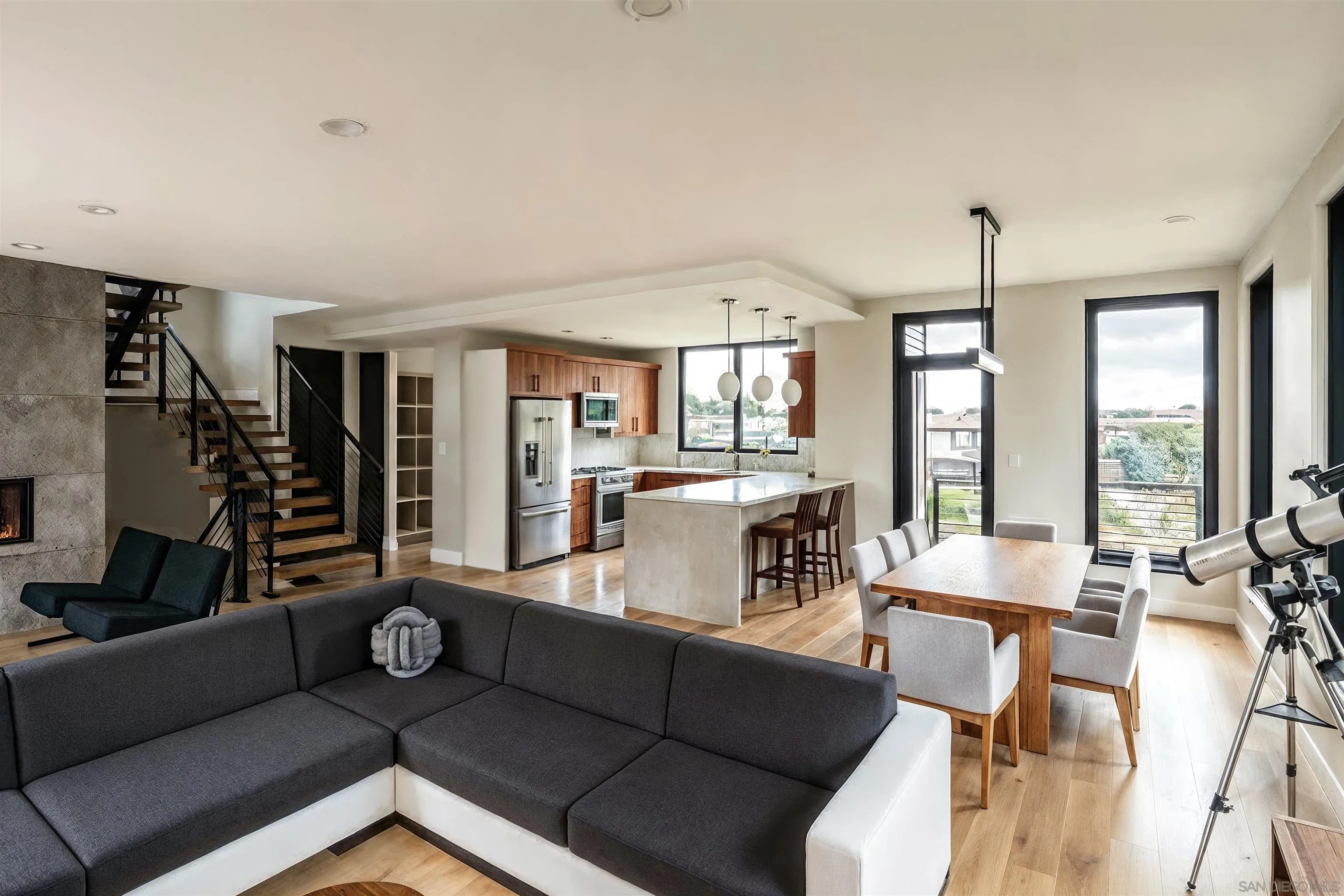 505 North Freeman Street, Unit 201 Oceanside, CA 92054 - Photo 7 of 14 a living room with furniture and a large window