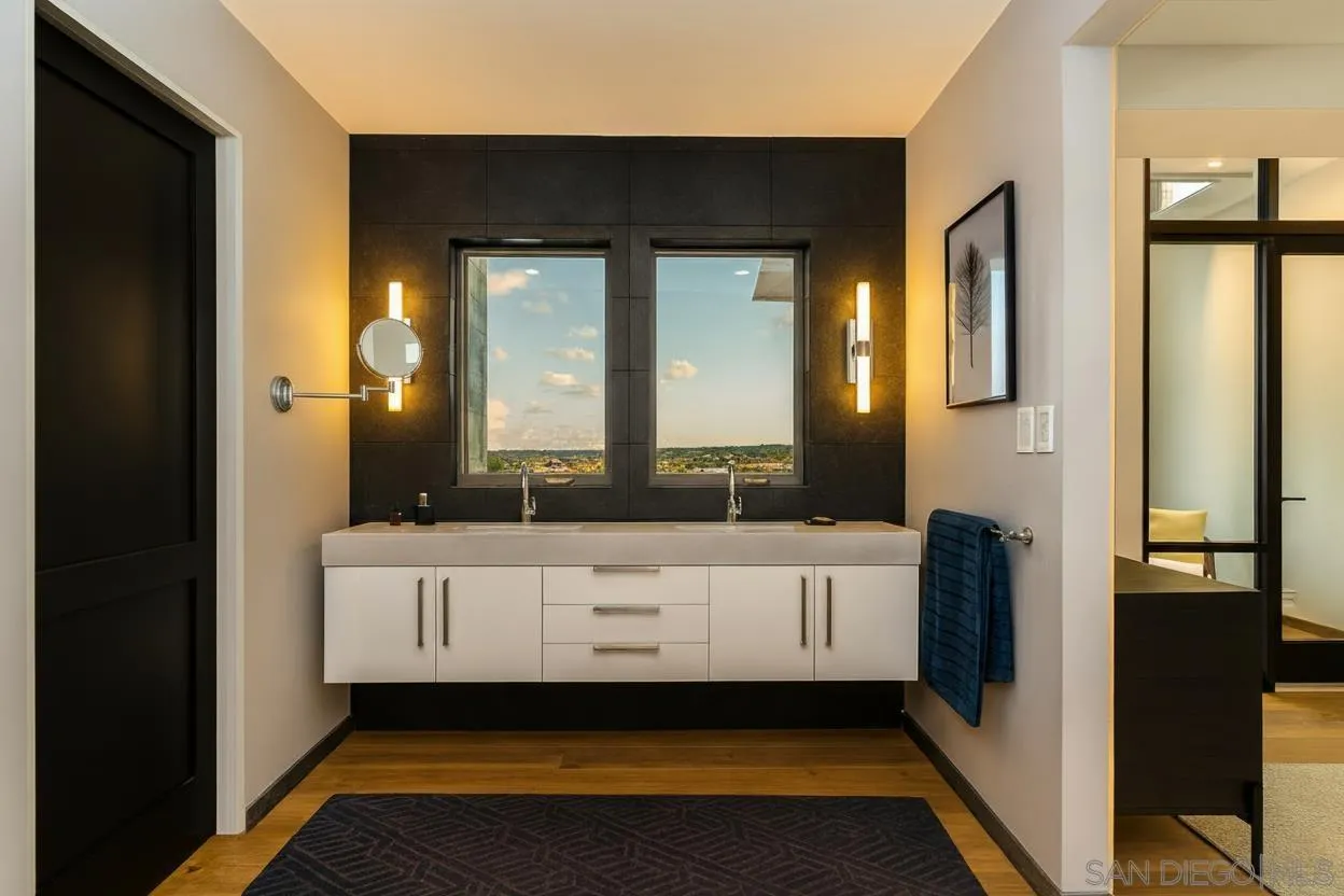 505 North Freeman Street, Unit 201 Oceanside, CA 92054 - Photo 10 of 14 a bathroom with a bathtub a mirror and a sink